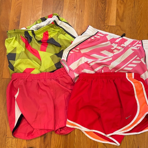 Lot of 4 Nike Women's Running Shorts - Yellow, Pink, Red, Green - Picture 1 of 8